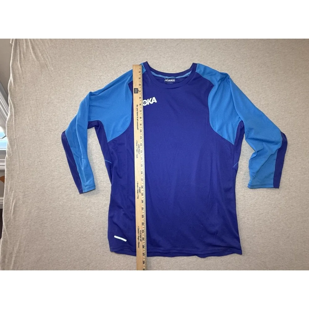 Hoka. Blue fitness shirt. size Medium. Blue 100% polyester 3/4 sleeve shirt